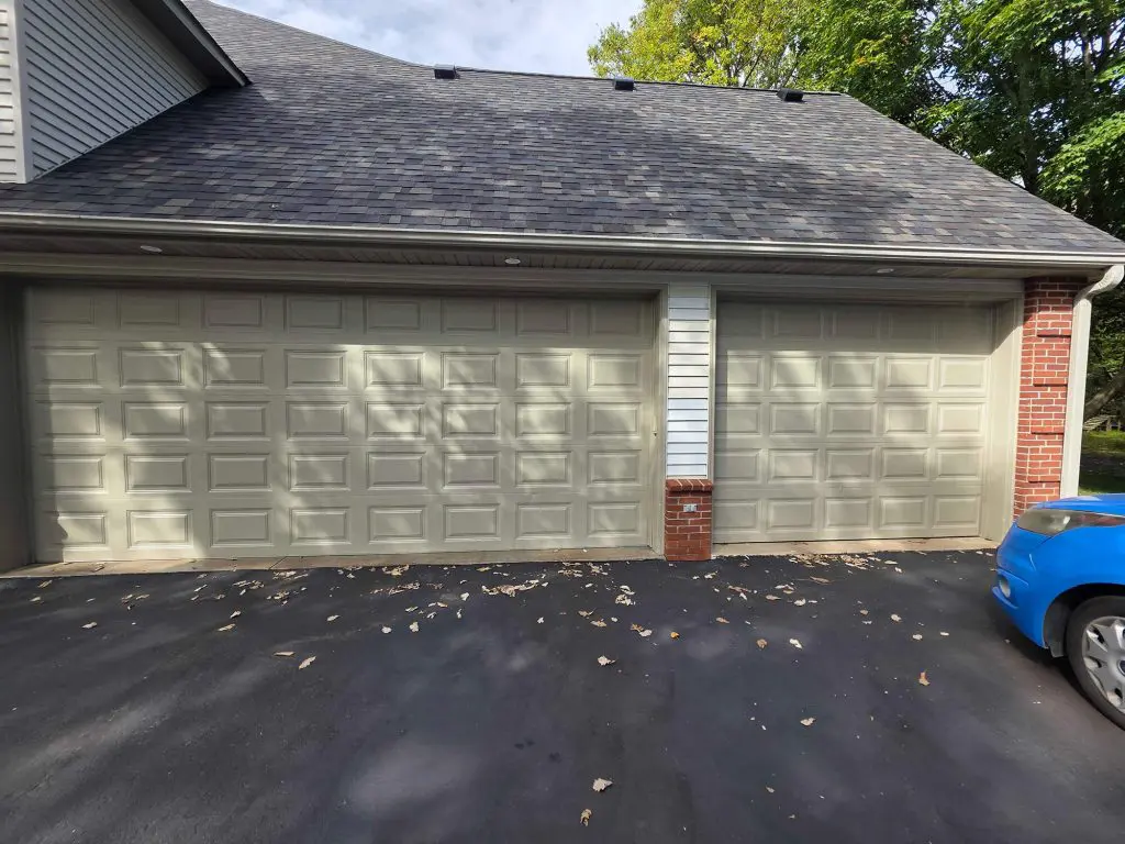 Two perfectly painted garage doors reflect quality craftsmanship by Texas Star Painting of Austin.