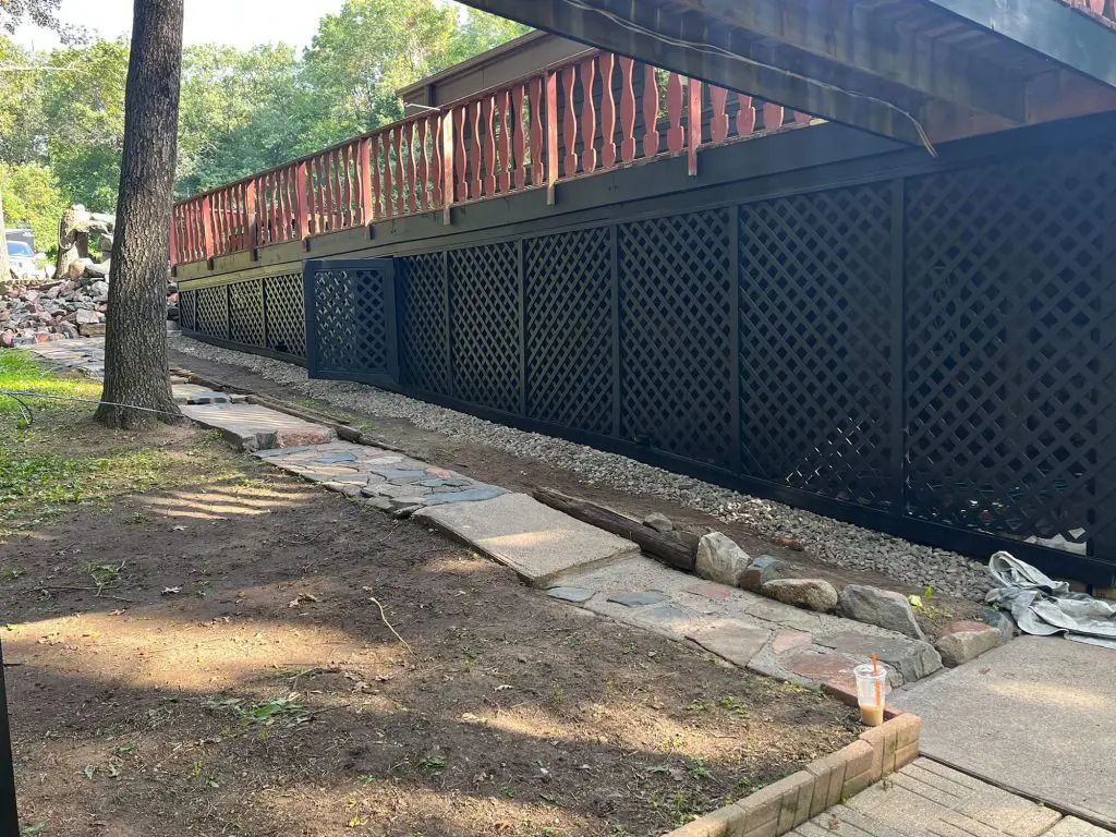 Subtly elegant dark lattice underdeck transformation completed by Texas Star Painting of Austin.