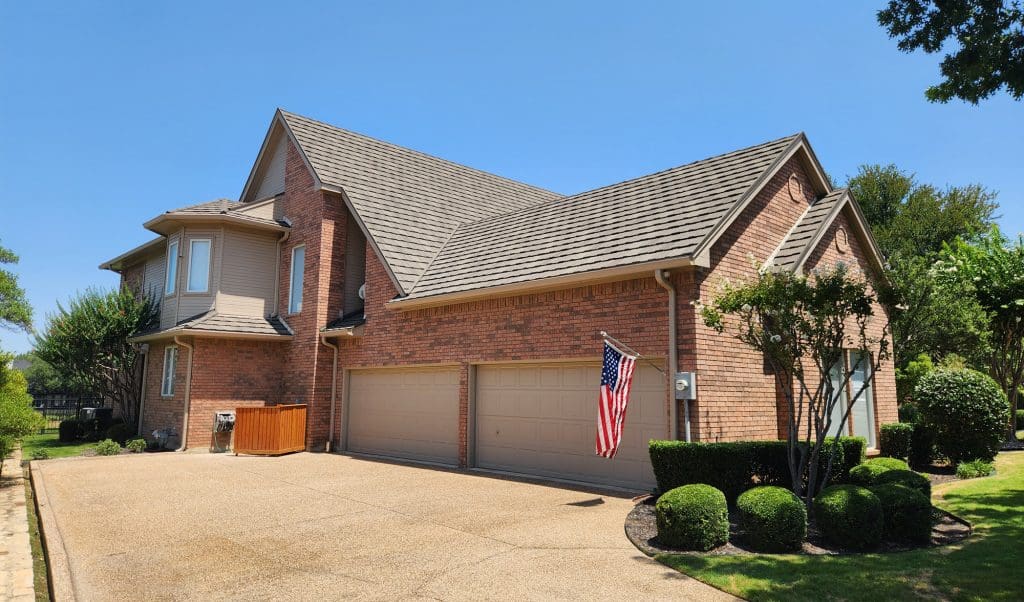 Beautiful brick home with fresh exterior finishes used to illustrate painting tips and advice for homeowners.